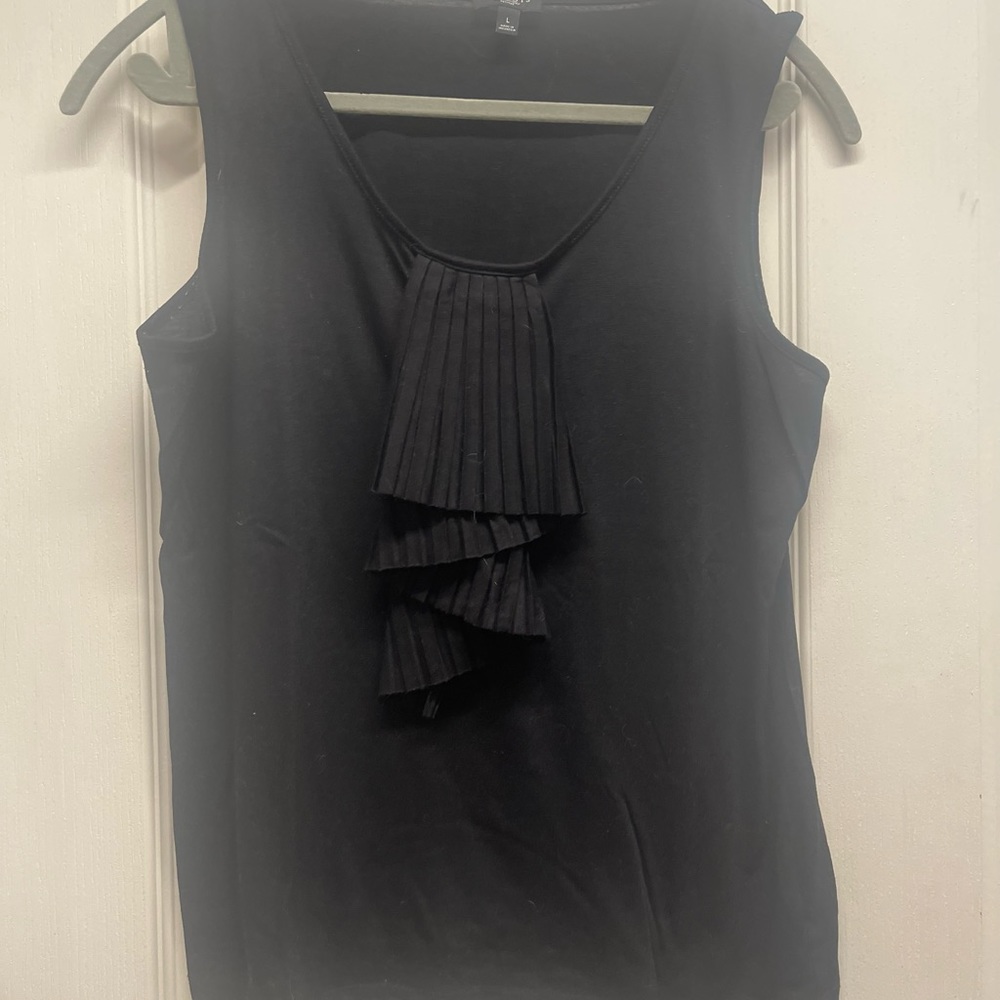 Black accordion style tank